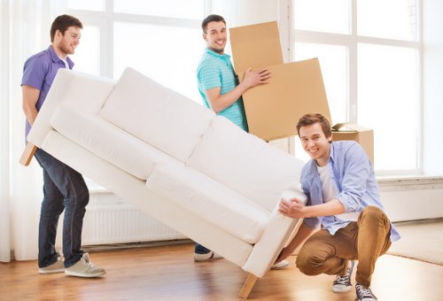 Charity-donated furniture and boxes from a Westwickham clearance